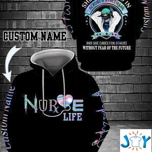 personalized nurse life she is clothed in scrubs and a face mask d hoodies